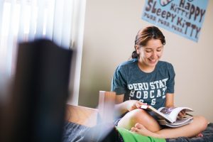 Student studying in a Morgan dorm room