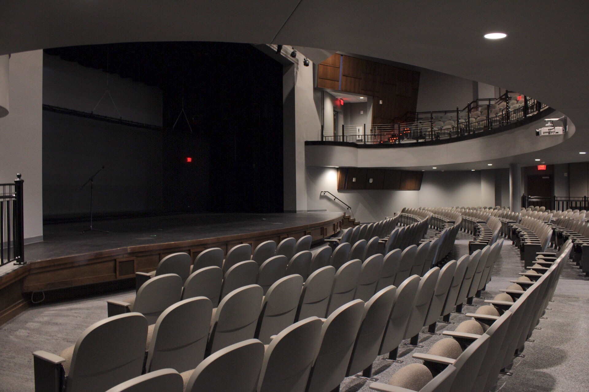 Auditorium seats, balcony and stage.