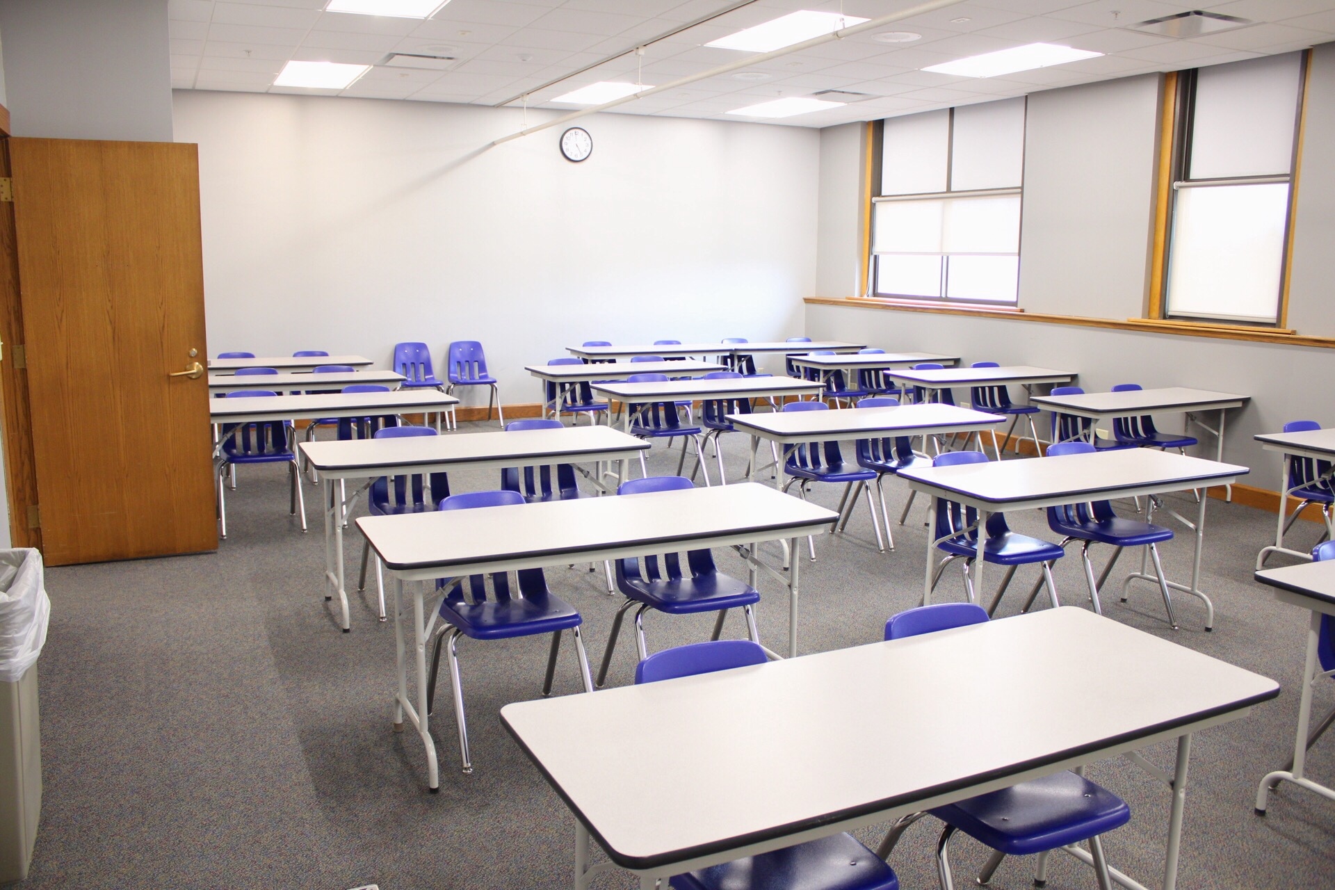 A view of TJ Majors 307 from the front of the class showing tables and chairs.