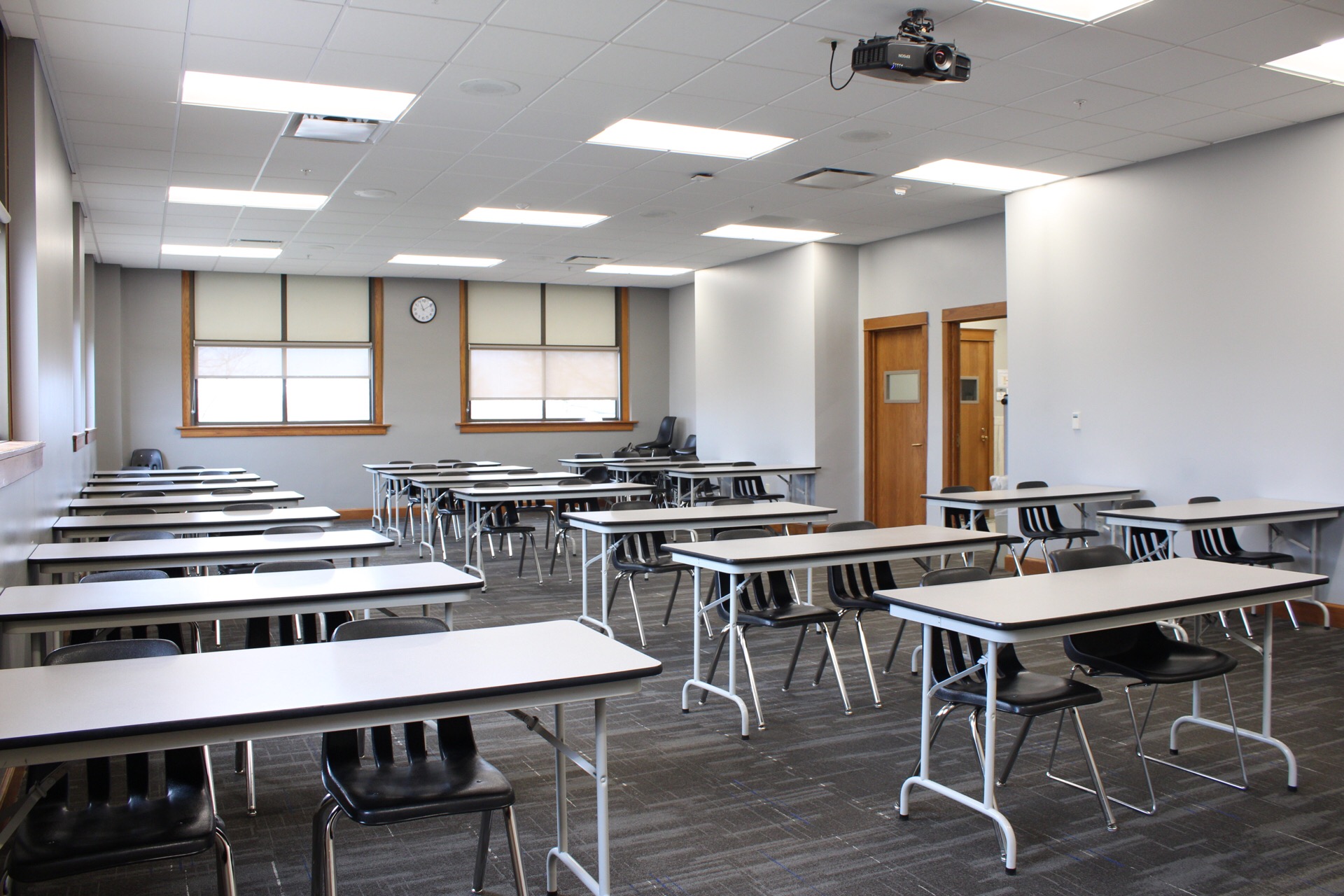 A vew from the front of TJ Majors 326 showing rows of tables and chairs.