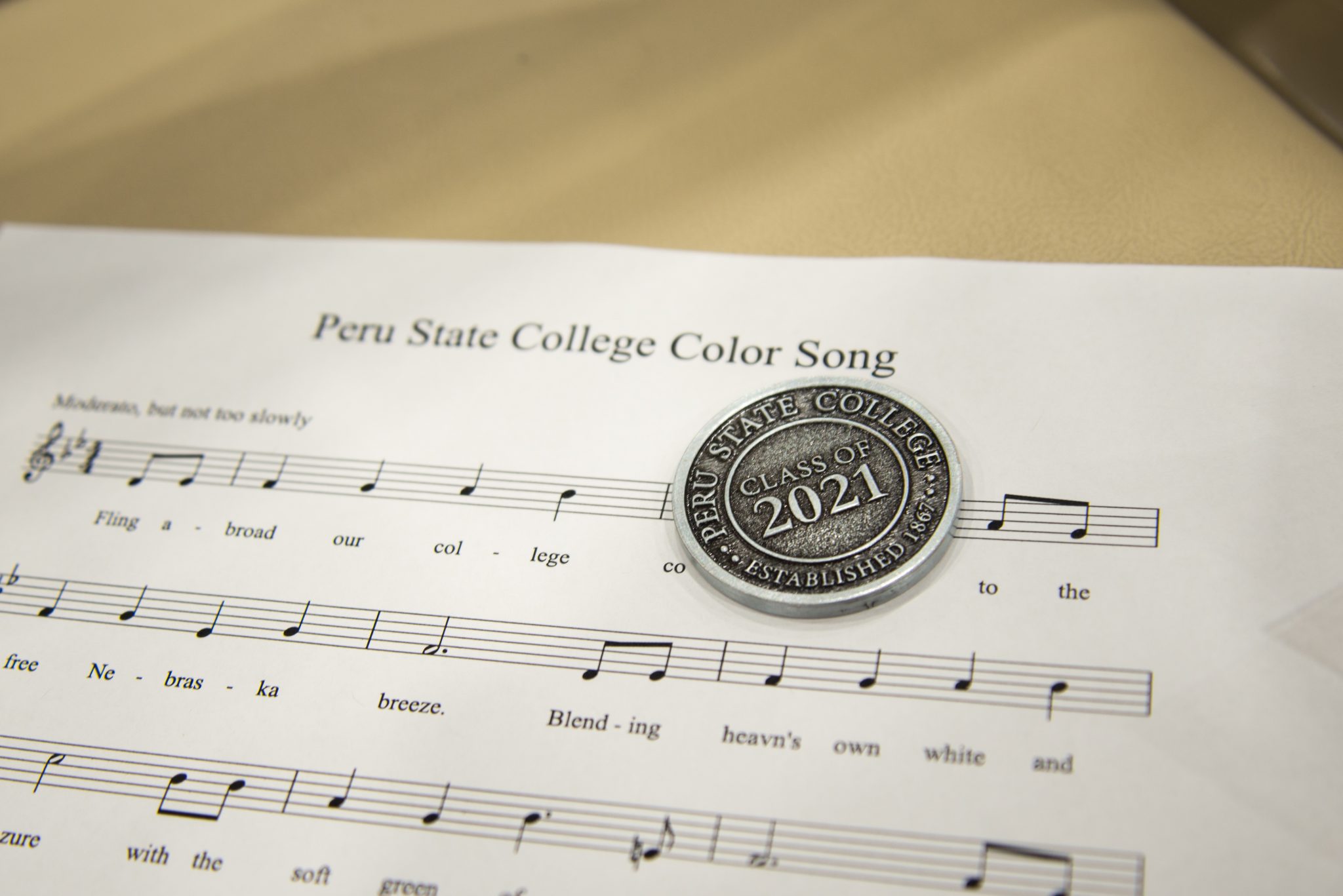 Color song sheet music and 2021 class coin