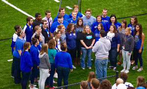 The Peru State Choir sang the National Anthem before the homecoming game.