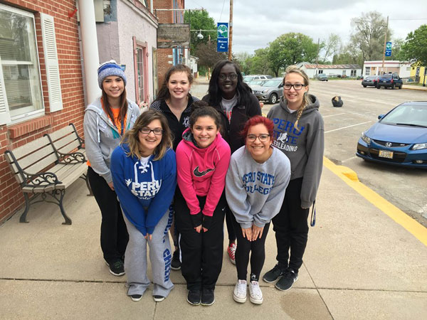 Peru State Cheerleaders both rows, L to R Brittany Ritter, Elizabeth Robine, M'Lisa Hartzell, Dayana Camacho, Nyanen Timbek, Sarah Morales and Brittany Fitzler