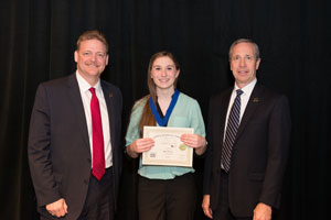 First Place, Senior Individual Historical Paper, Katelyn Nielson with Todd Simpson, Executive Director of the Peru State College Foundation (left) and Dr. Dan Hanson, President of Peru State College (right).