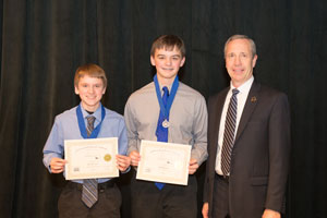 First Place in Junior Group Interpretive Website, James Kearney and Luke Partsch with President of Peru State College, Dr. Dan Hanson