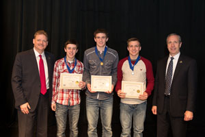 First Place, Senior Group Performance: Jaxson Balm, Wyatt Nickels, Trey Stutheit with Todd Simpson, Executive Director of the Peru State College Foundation (left) and Dr. Dan Hanson, President of Peru State College (right).