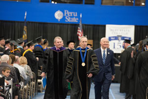 President Dan Hanson, flanked by Nebraska State College System Chancellor, Stan Carpenter, and Governor Pete Ricketts, leading the recessional.