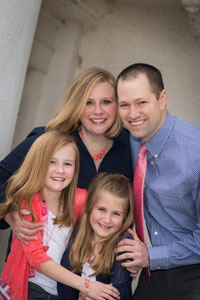 Dr. Jesse Dorman with his wife Kimberly and their daughters Lily and Evie.
