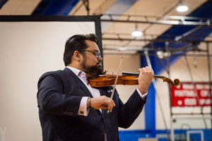 Vijay Gupta with violin.