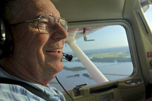 Dr. Long flying during the 2011 floods. Photo by Bill Clemente.