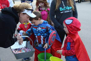 Children trick or treating in downtown Peru.