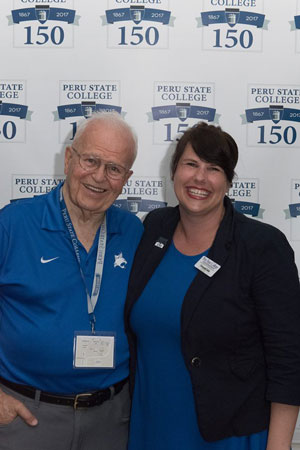 Harrison at the sesquicentennial anniversary of Peru State College. He is pictured with the Director of the Peru State National Alumni Association, Deborah Solie
