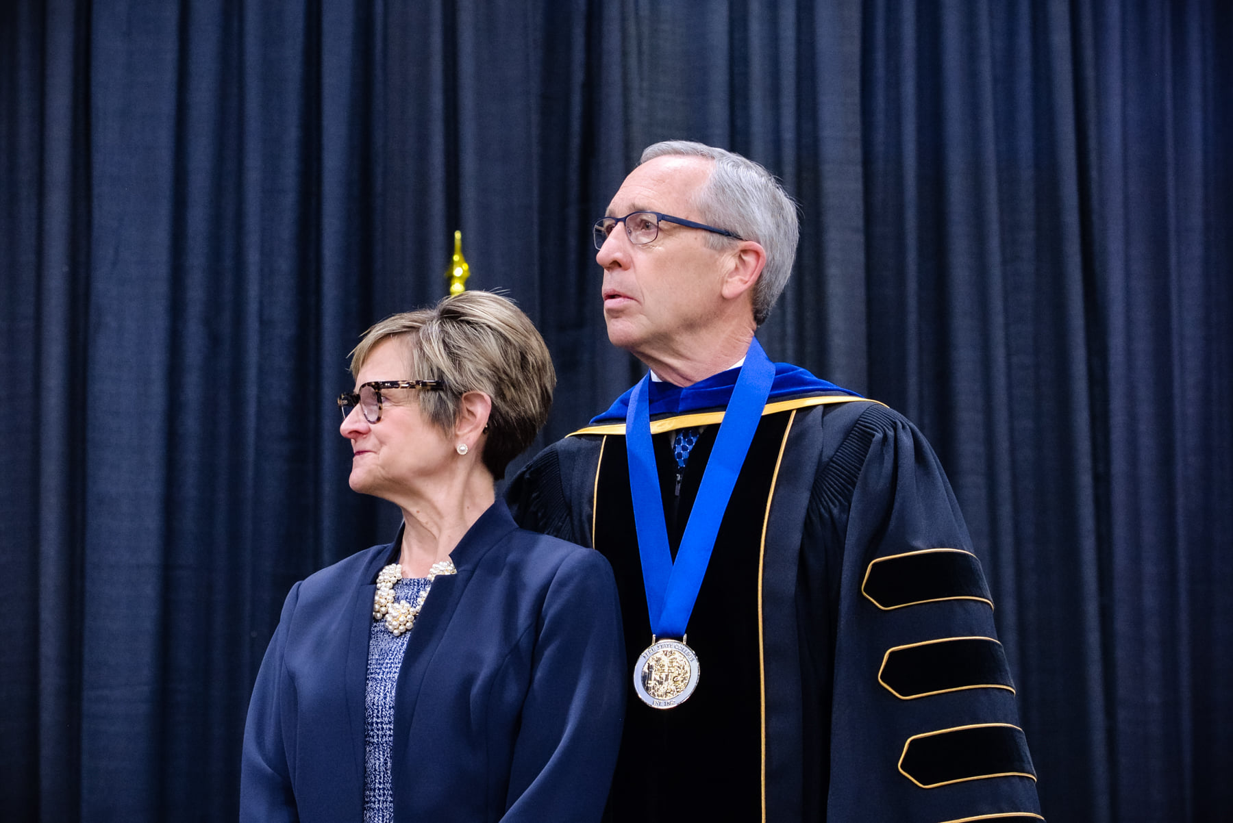 Dan and Elaine Hanson on the stage for commencement.