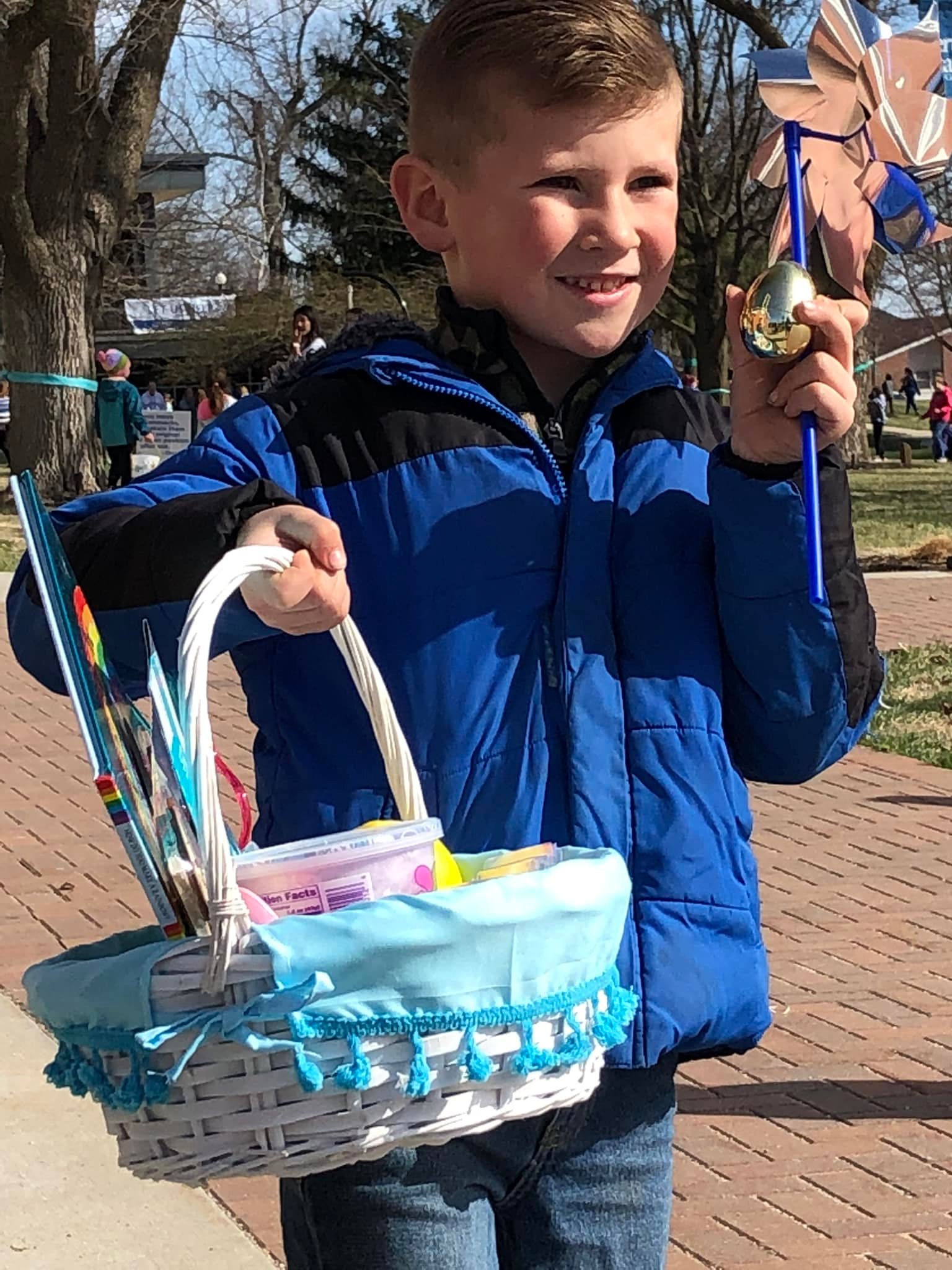 One of the three “Golden Egg” winners happily displays his reward!